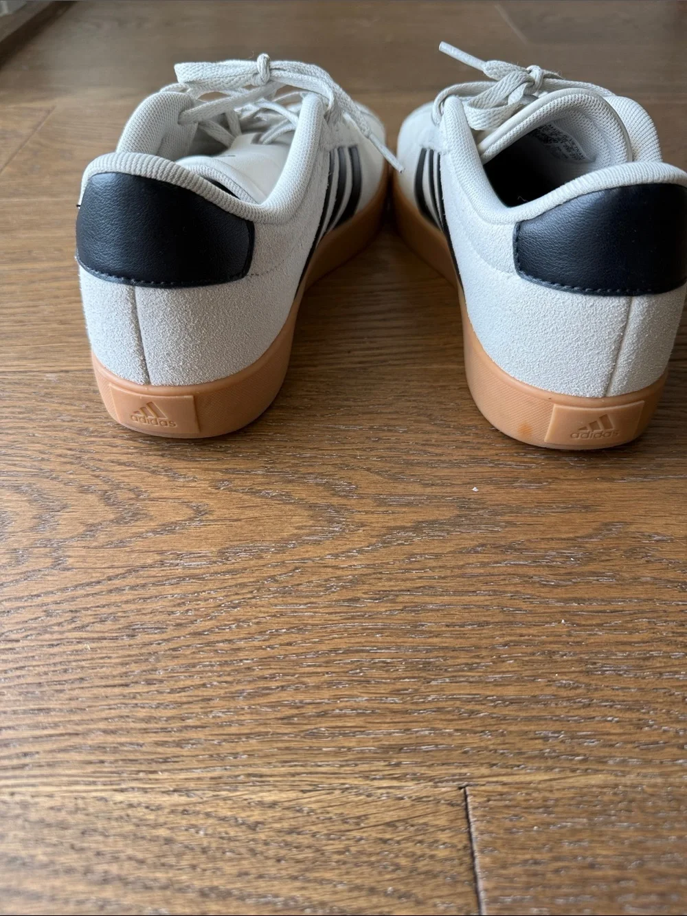 adidas kids (fits women’s size 6.5) Off-White Suede Sneakers with Black Stripes